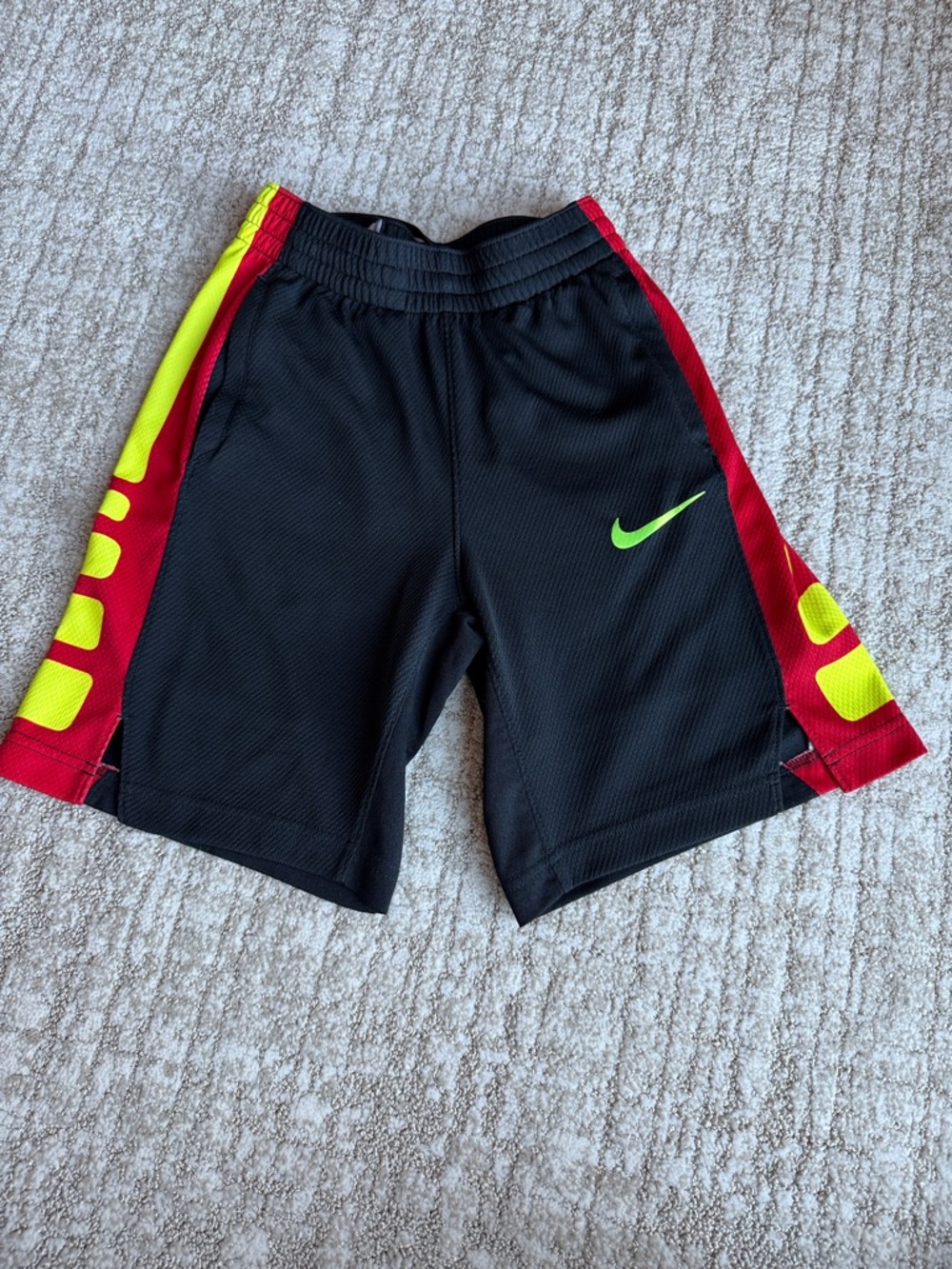 Nike Black Athletic Shorts with Neon Yellow & Red Side Panels